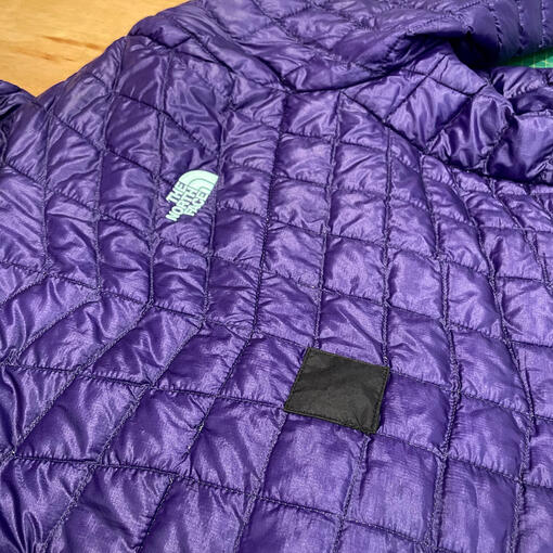 Patched up insulated jacket. Patched up insulated jacket.