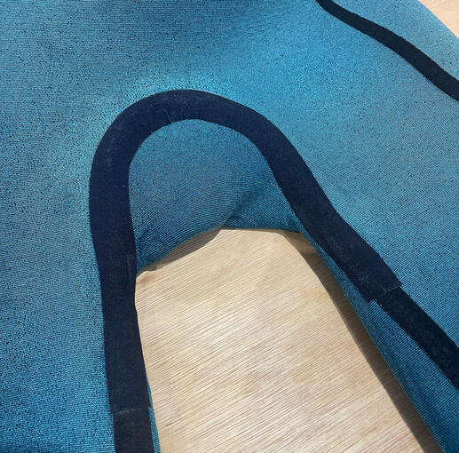 Repaired and seam taped surfing wetsuit. Repaired and seam taped surfing wetsuit.