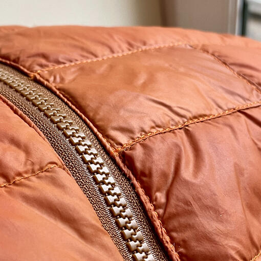 Full zip replacement and sewn patch on down jacket. Full zip replacement and sewn patch on down jacket.
